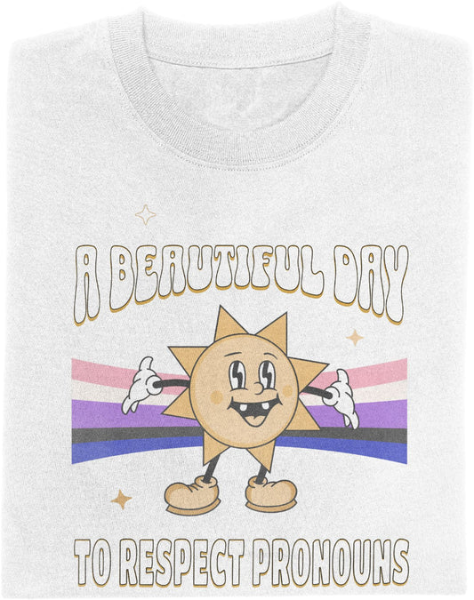 White T-shirt with cartoon sun character over genderfluid flag and text saying "A Beautiful Day to Respect Pronouns"